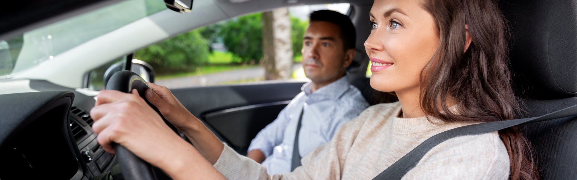 Woman driving her boyfriend