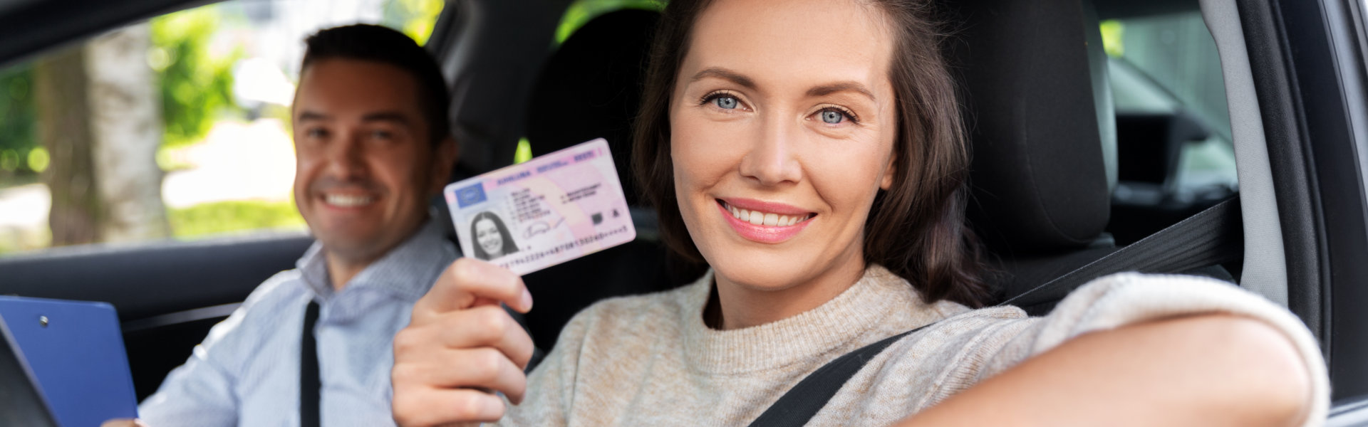 Woman showing her license