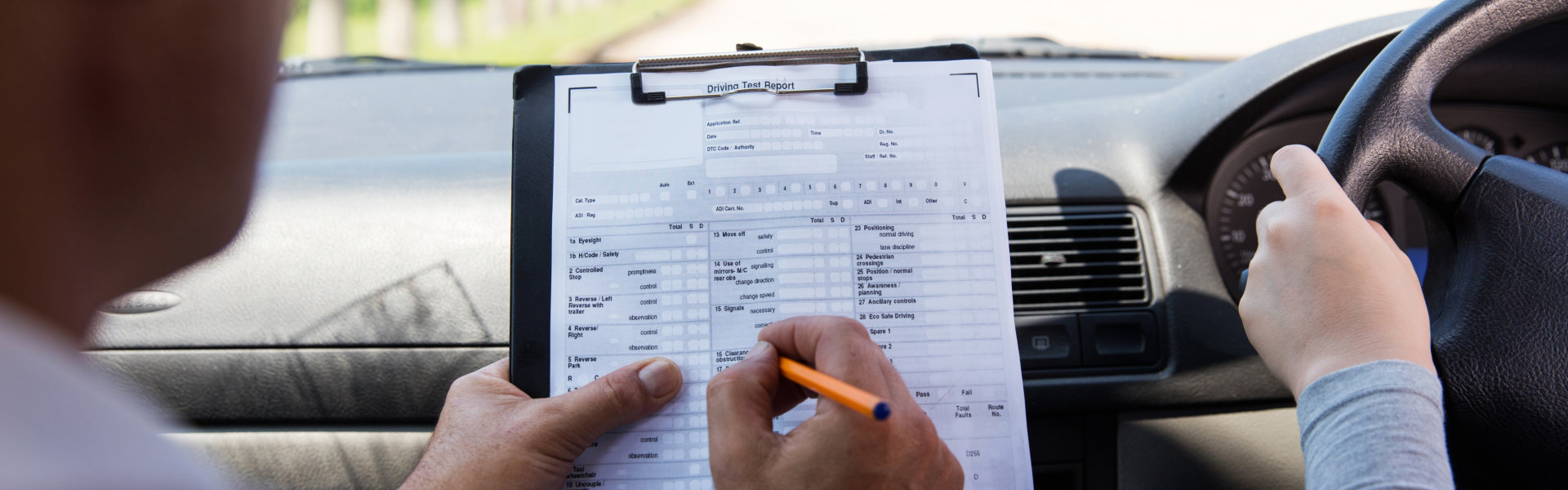 Instructor showing his records